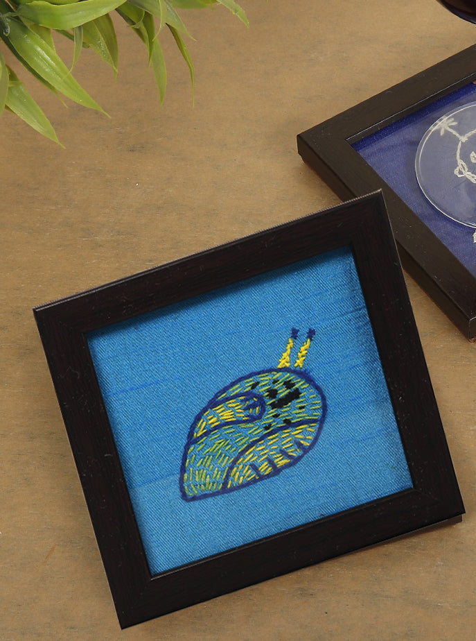INDHA Snail Design Chain Stitch Hand embroidery On Sky Blue Dupion Silk Wooden Glass Coaster Set | Set Of 2 Glass Coaster | Hand Embroidered Utility Décor | Home Utility | Gifting |